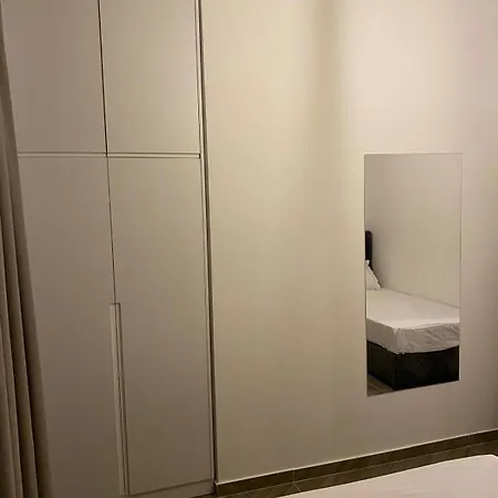 Aj *